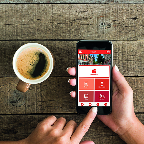 hand using phone white screen on top view Cityapp Dudelange